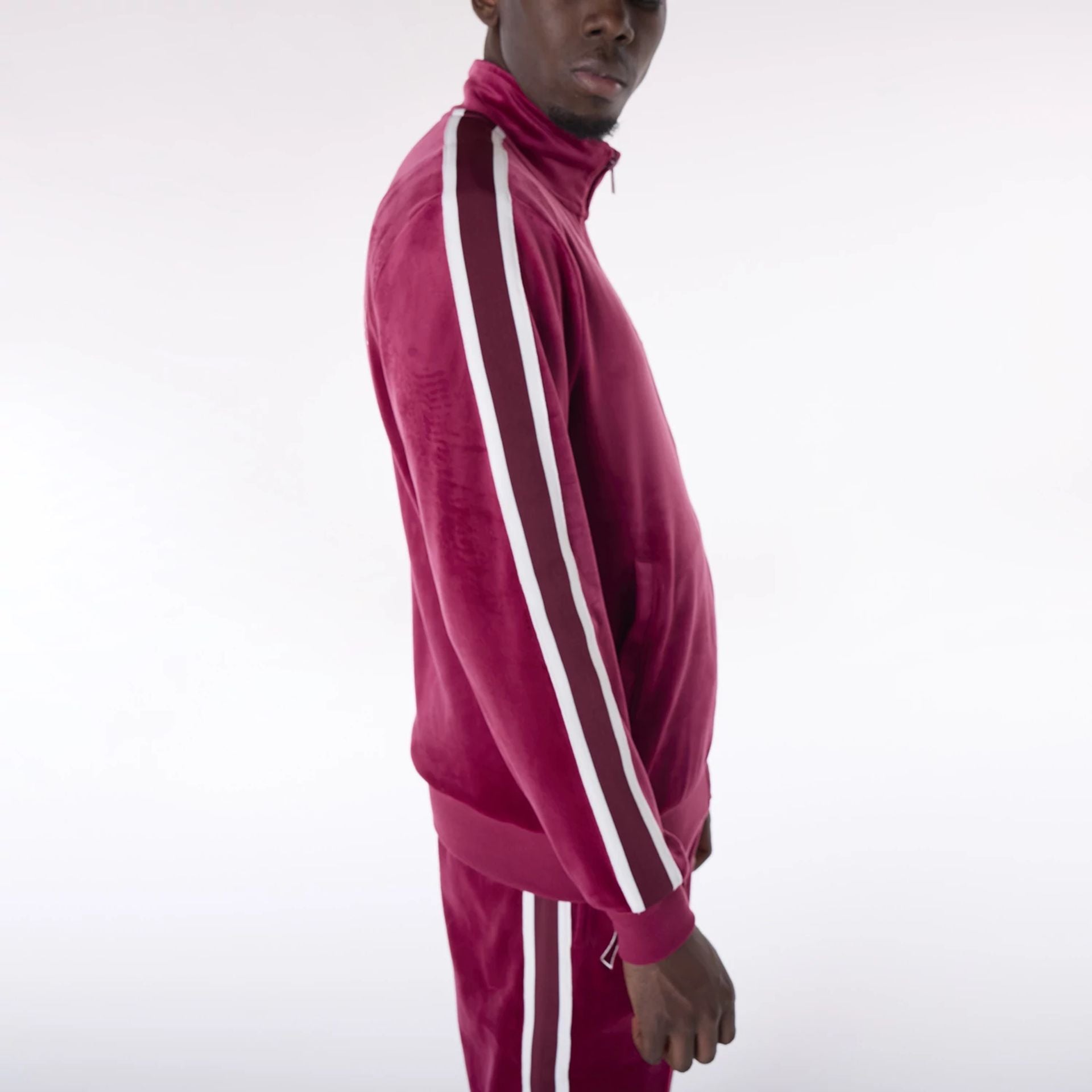 The Male model is wearing New York Yankees MLB Velour Dark Red Track Jacket 6