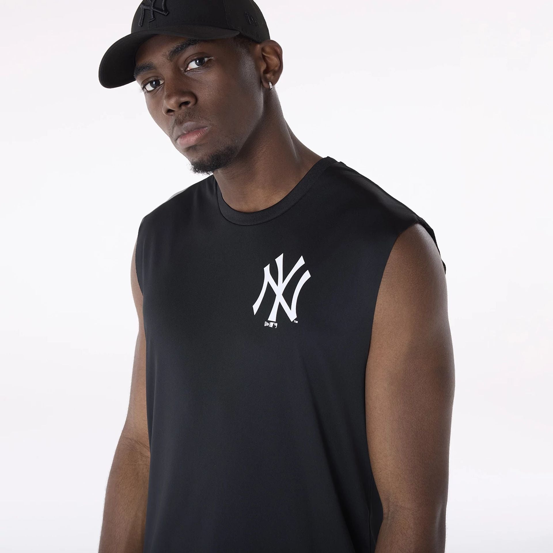 The Male model is wearing New York Yankees MLB Black Sleeveless Vest 3