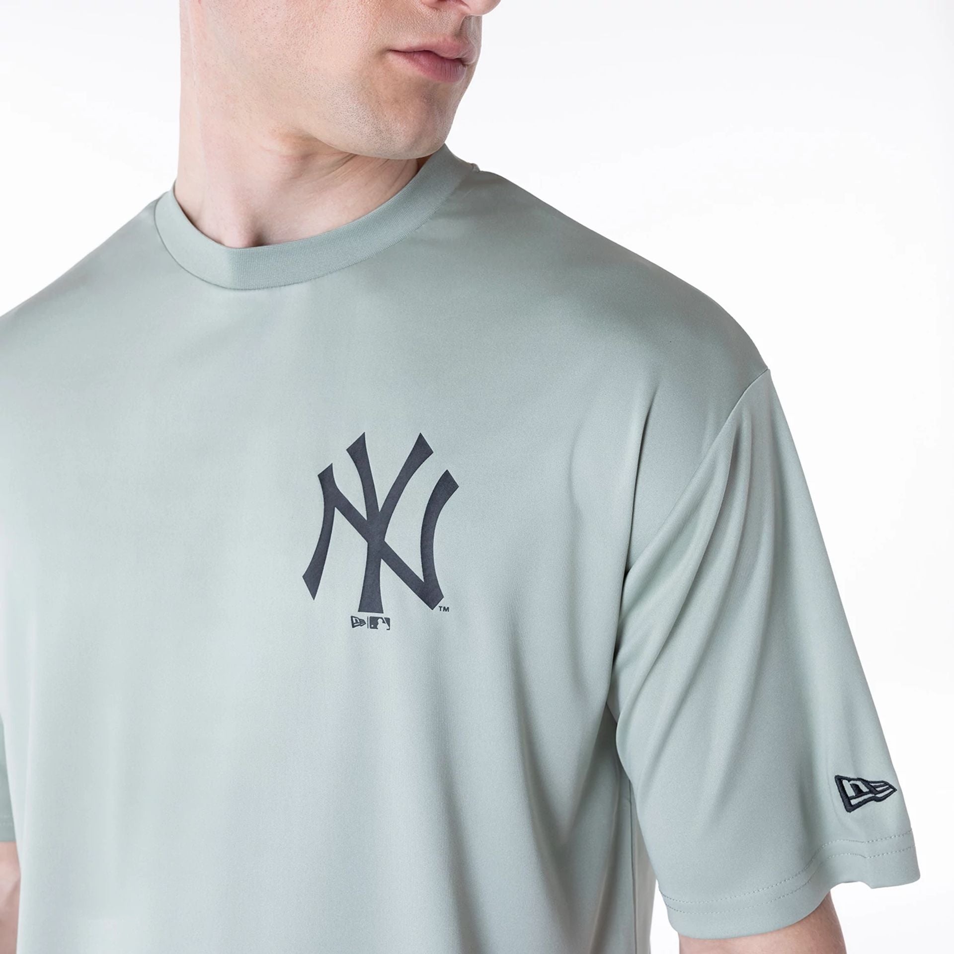 The Male model is wearing New York Yankees League Essential Pastel Green T-Shirt 7