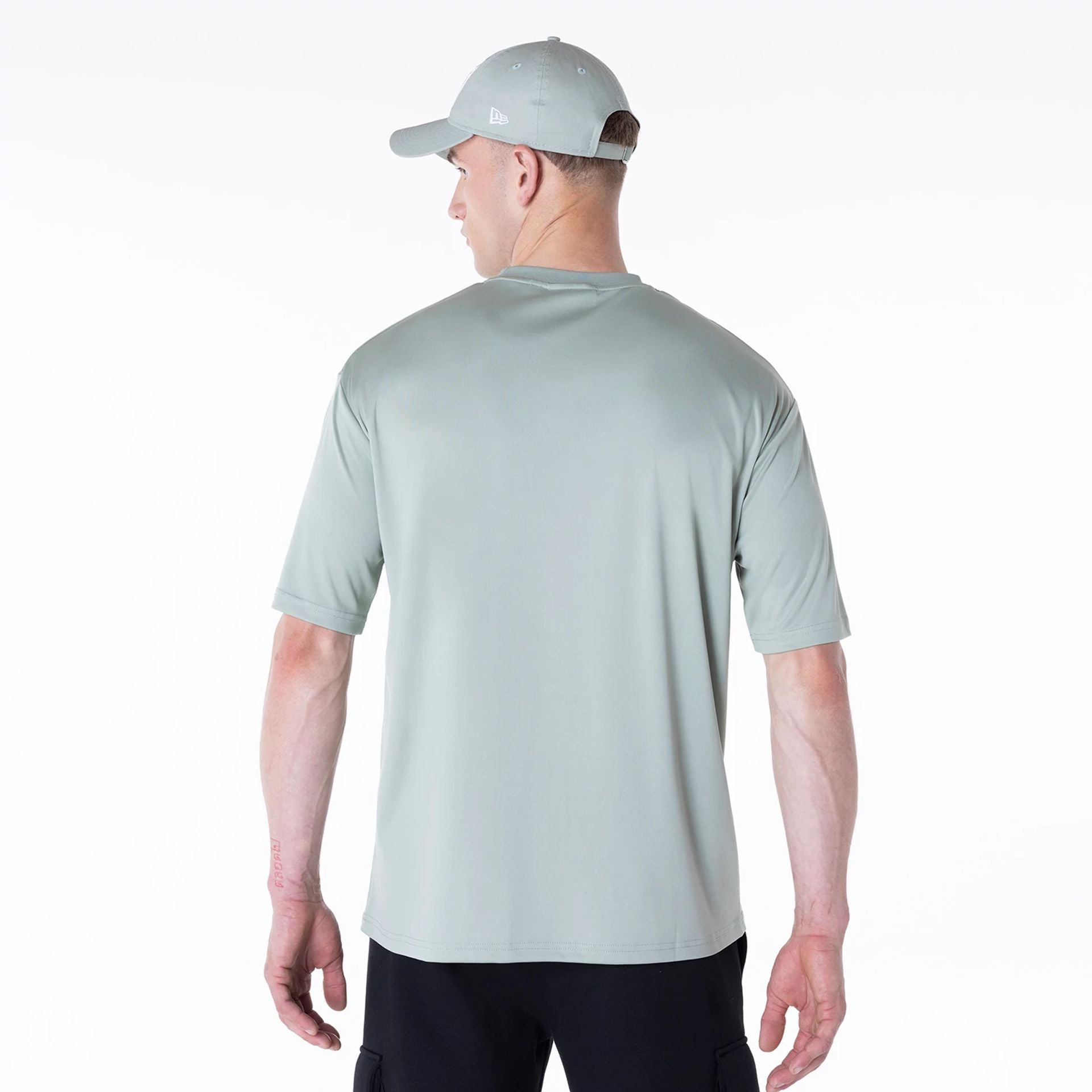 The Male model is wearing New York Yankees League Essential Pastel Green T-Shirt 2