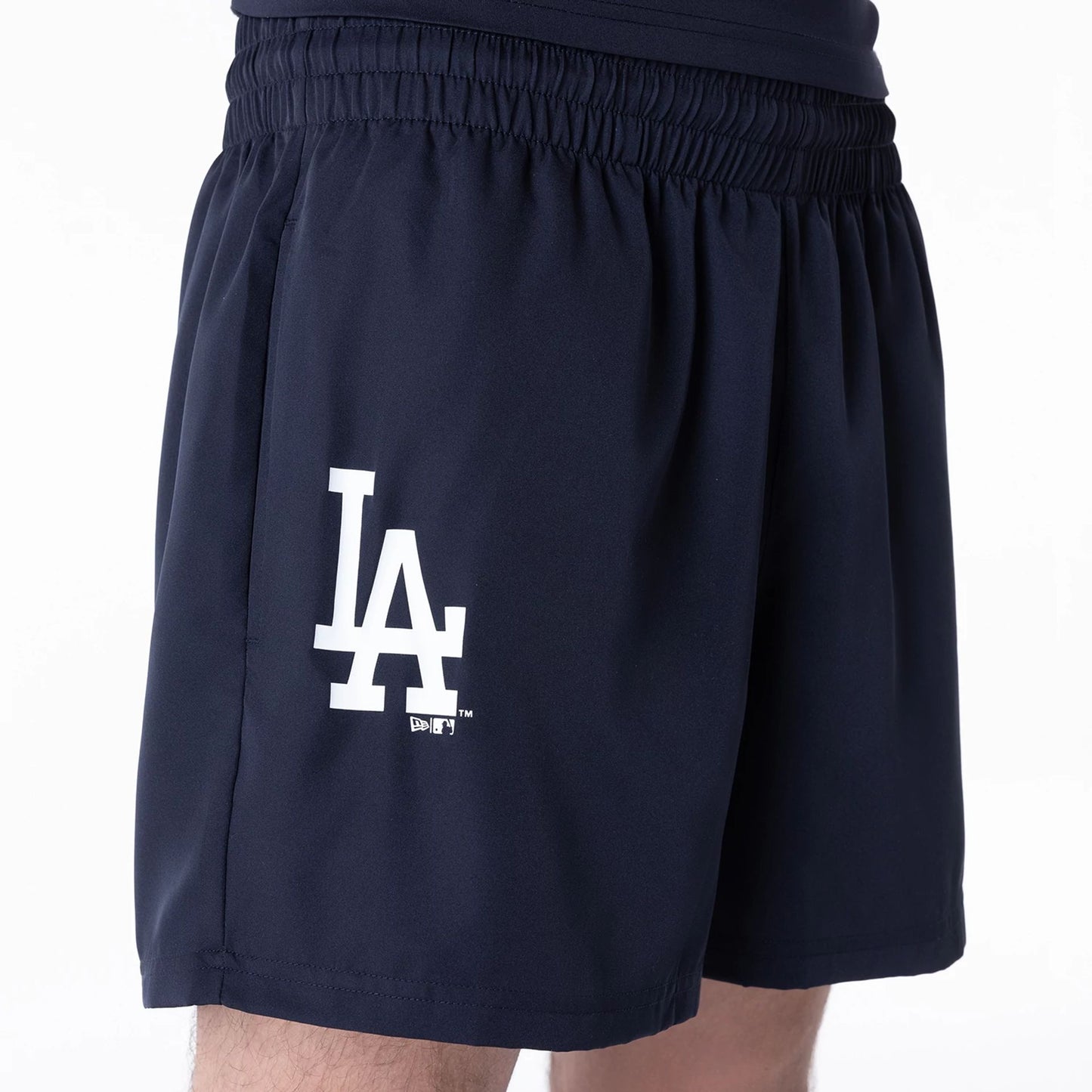 The Male model is wearing LA Dodgers League Essential Navy Shorts 2