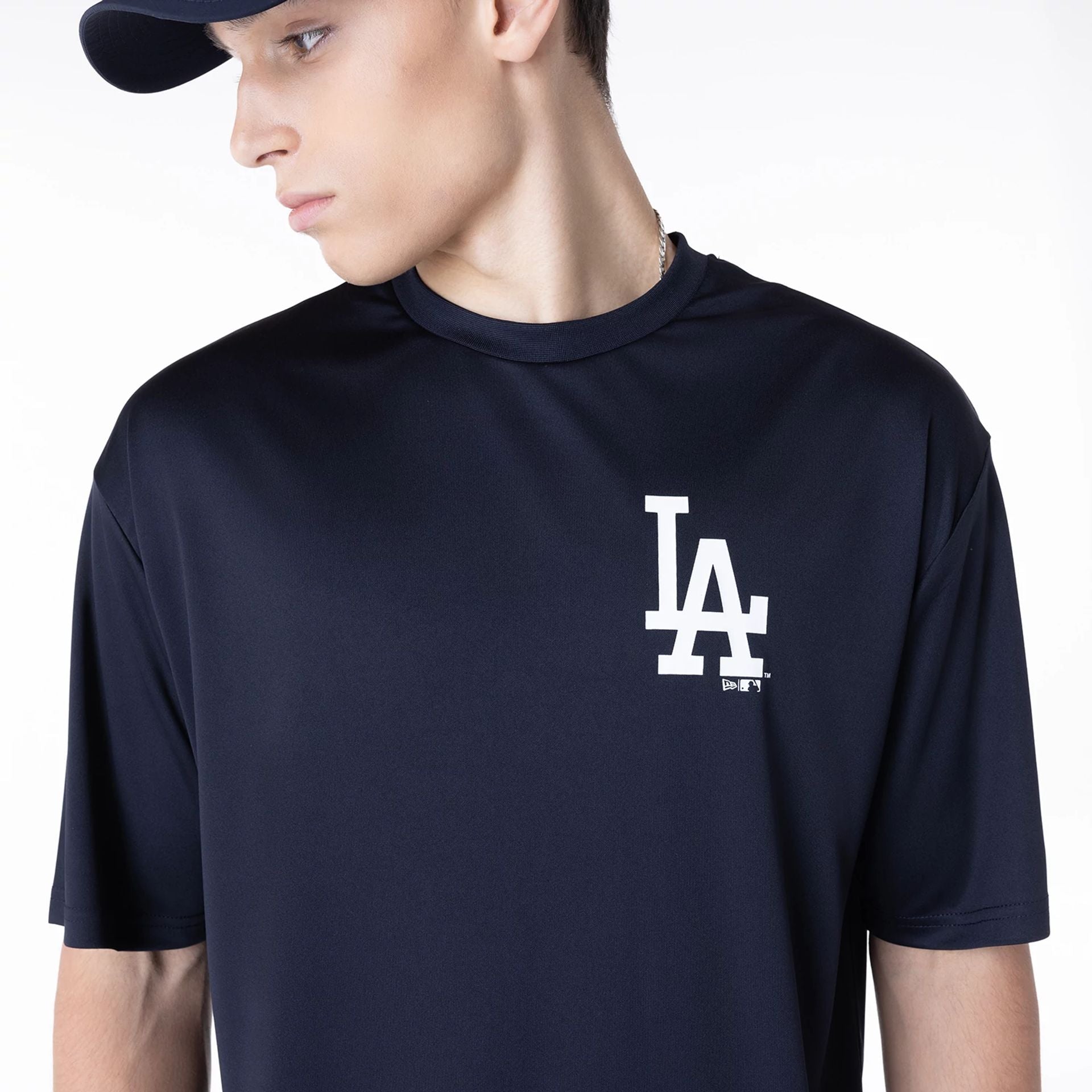 The Male model is wearing LA Dodgers League Essential Navy T-Shirt 6