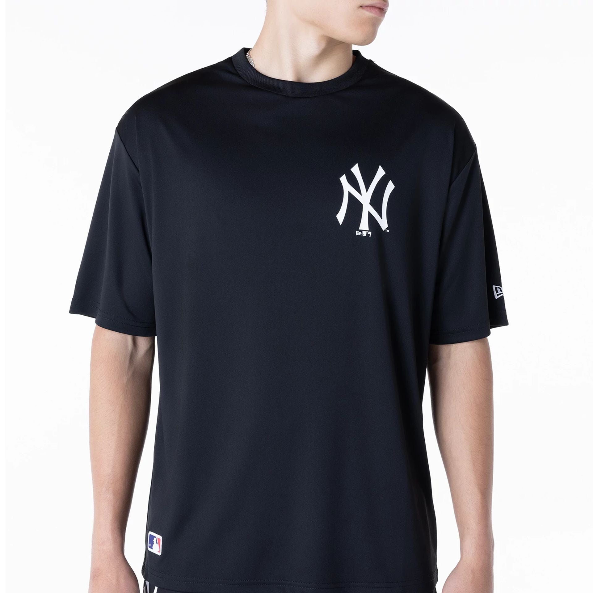 The Male model is wearing New York Yankees League Essential Black T-Shirt 8