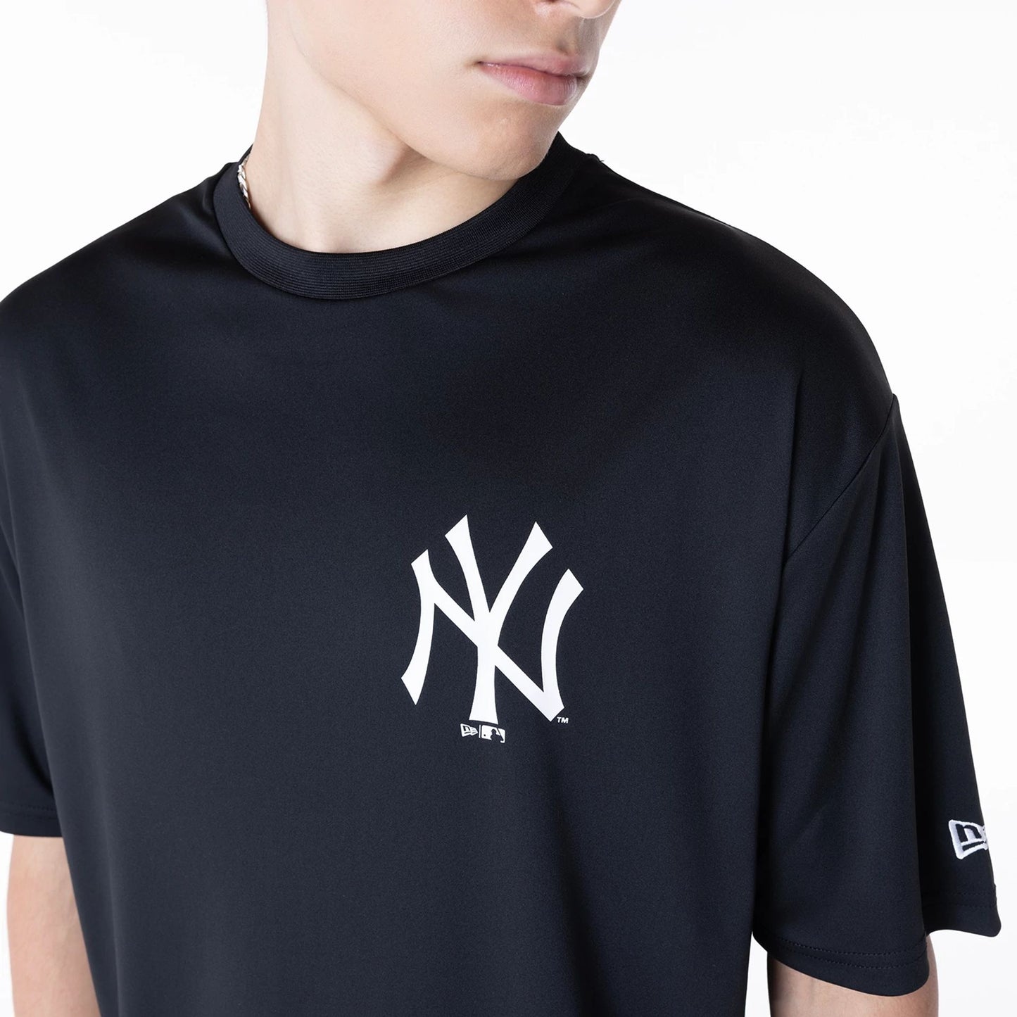 The Male model is wearing New York Yankees League Essential Black T-Shirt 7