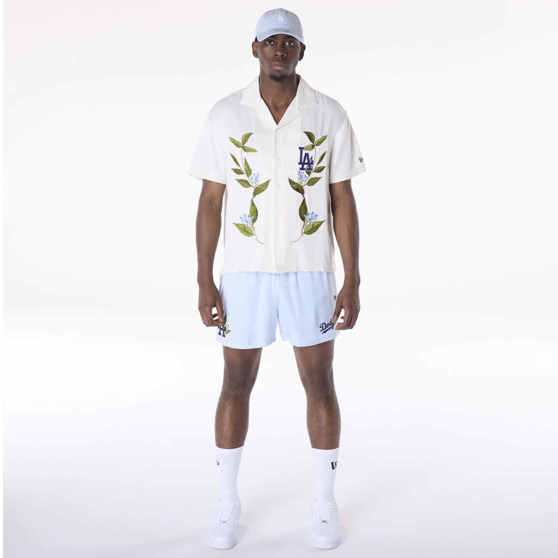 The Male model is wearing LA Dodgers Floral Revere Open White Short Sleeve Shirt 4