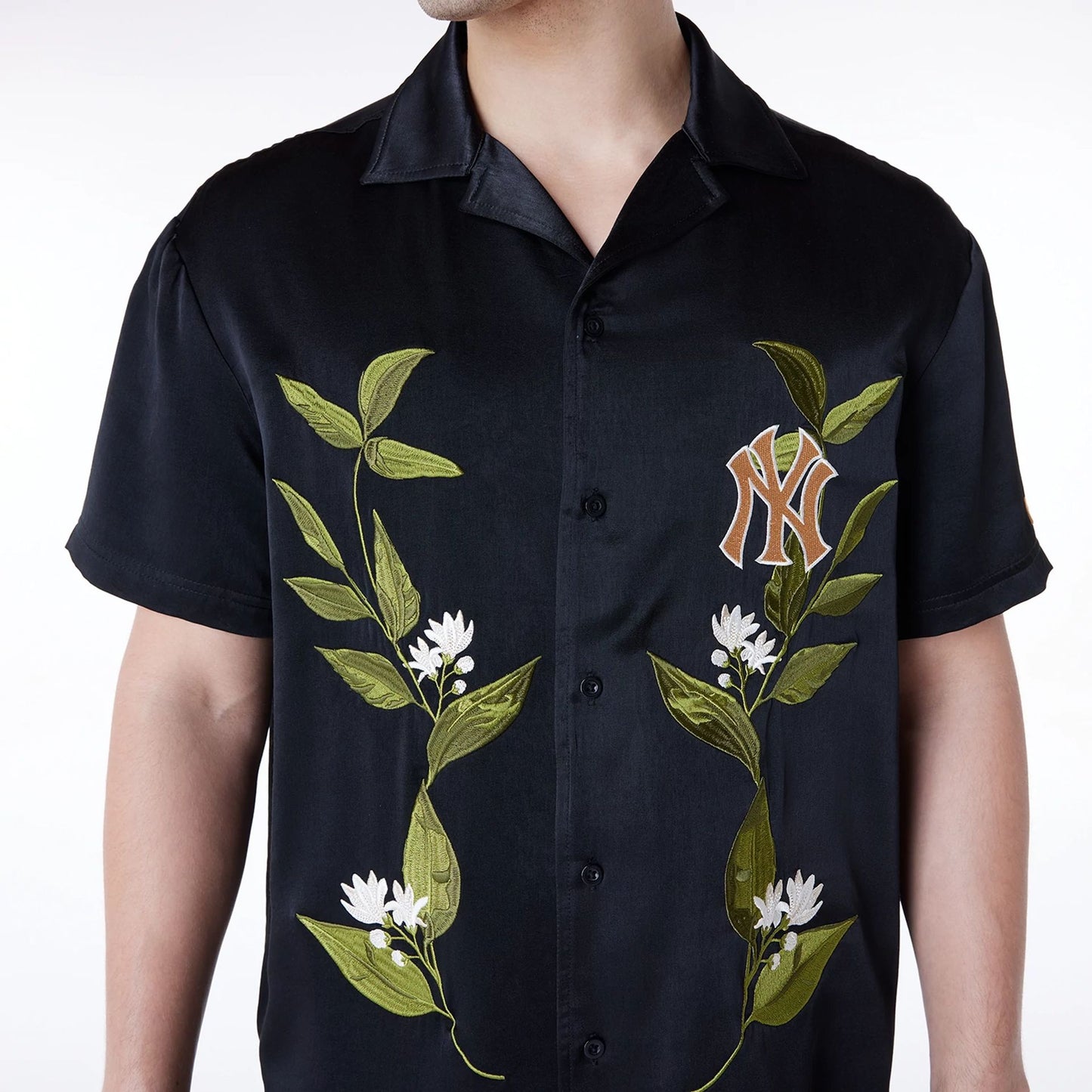 The Male model is wearing New York Yankees Floral Revere Black Short Sleeve Shirt 7