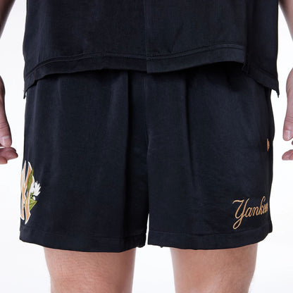 The Male model is wearing New York Yankees MLB Woven Black Shorts 2