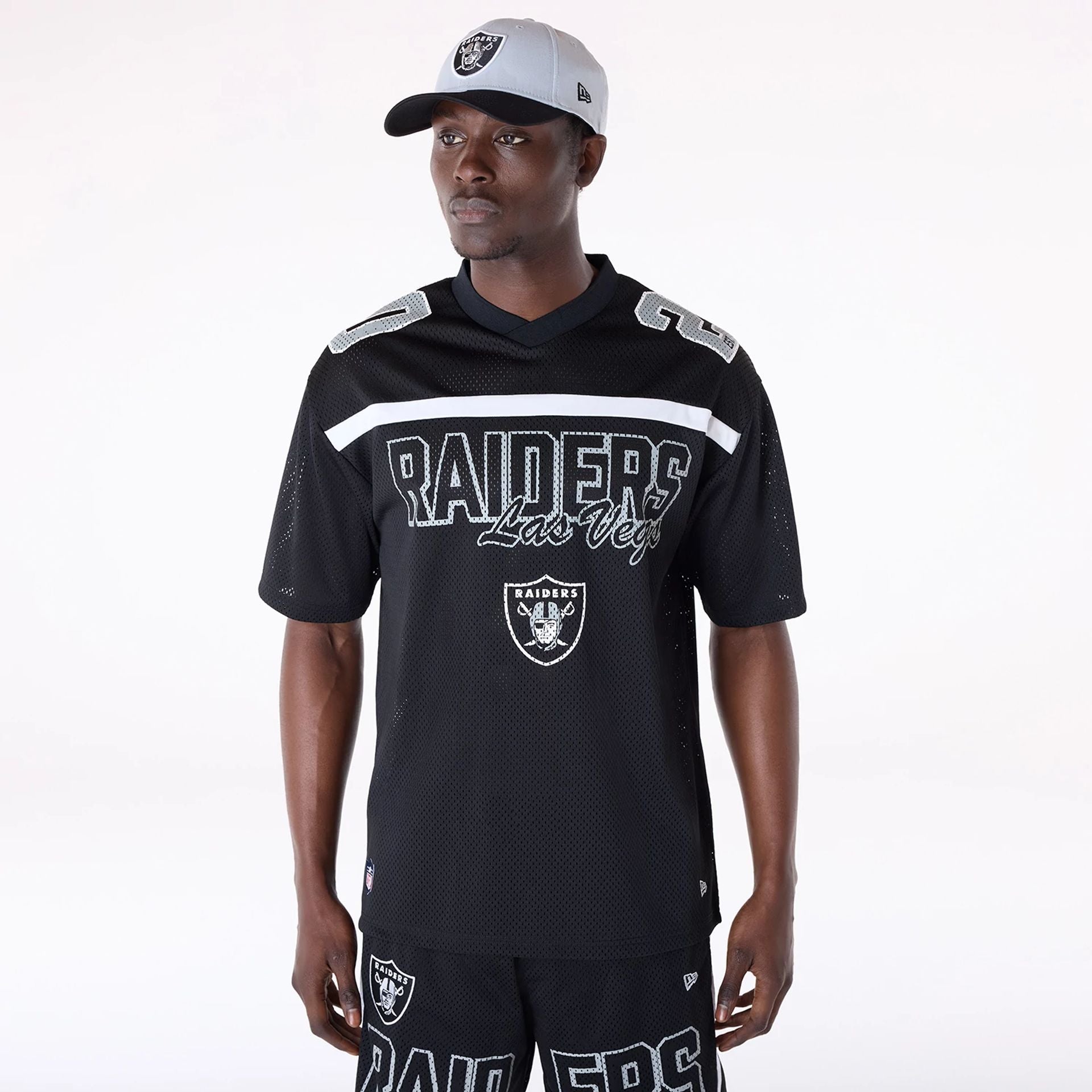 The Male model is wearing Las Vegas Raiders NFL Mesh Black T-Shirt 1