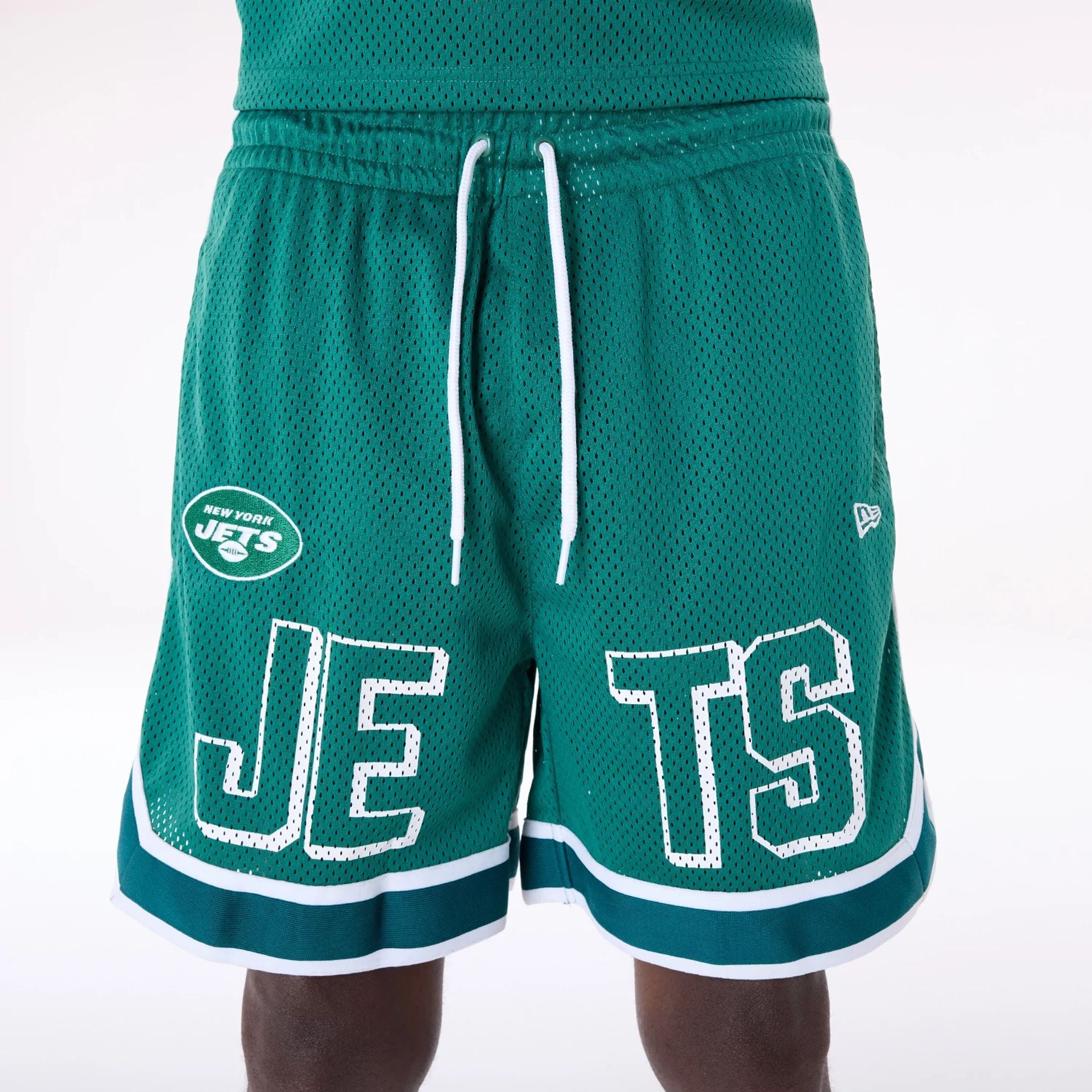 The Male model is wearing New York Jets NFL Mesh Green Shorts 2