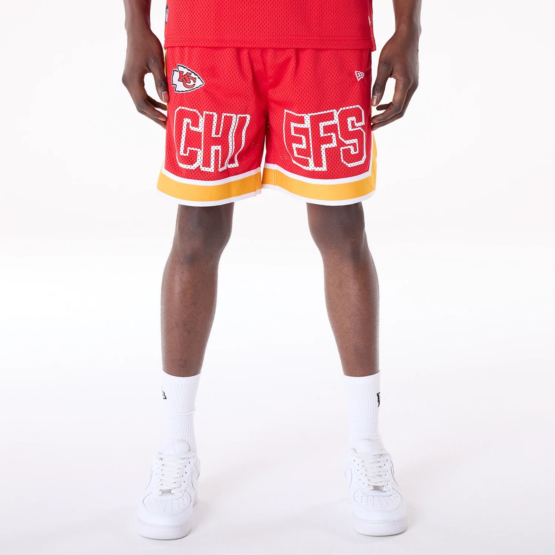 The Male model is wearing Kansas City Chiefs NFL Mesh Red Shorts 1