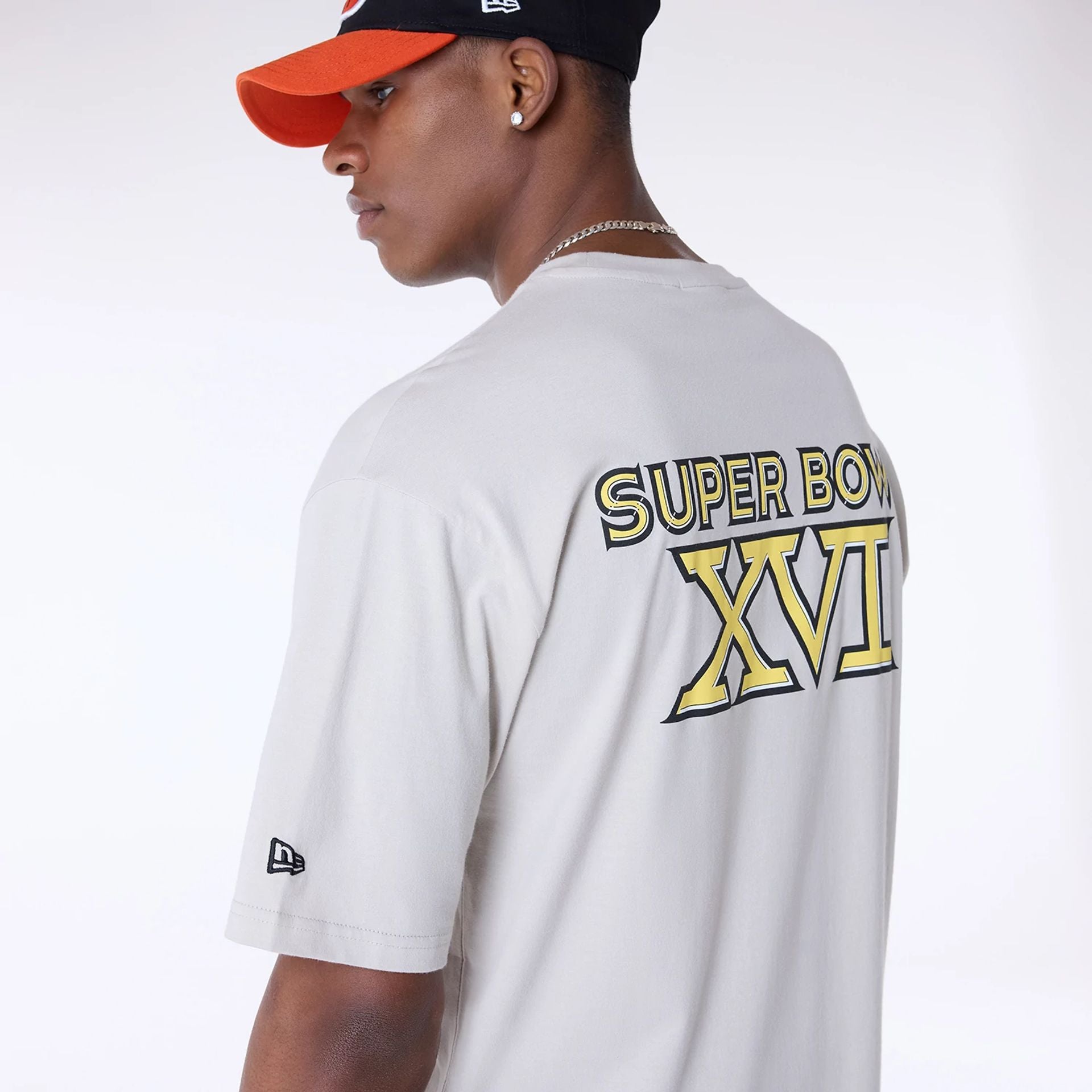 The Male model is wearing Cincinnati Bengals Super Bowl Graphic Cream Oversized T-Shirt 4