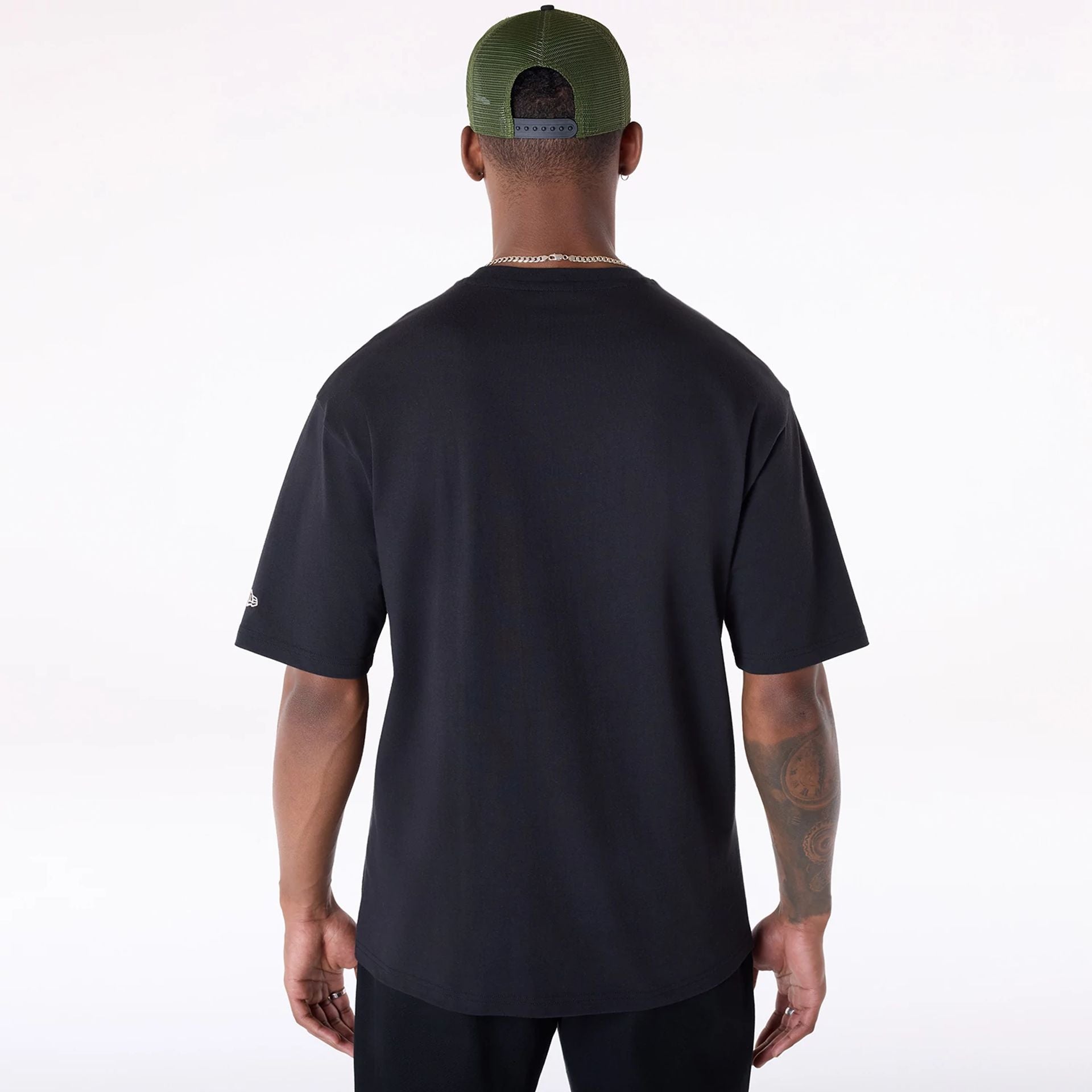 The Male model is wearing New Era Basketball Graphic Black T-Shirt 2