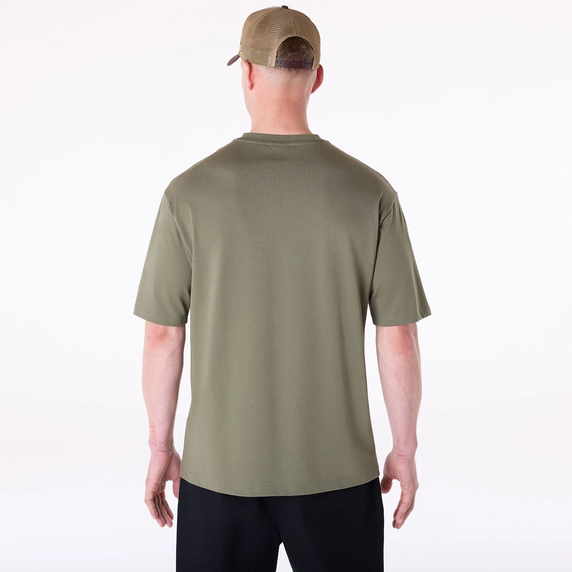 The Male model is wearing New Era Football Graphic Green T-Shirt 2