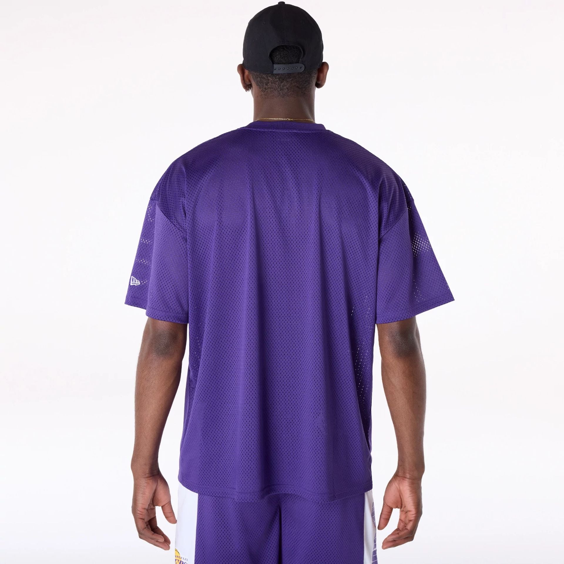 The Male model is wearing LA Lakers NBA Graphic Purple Mesh T-Shirt 2