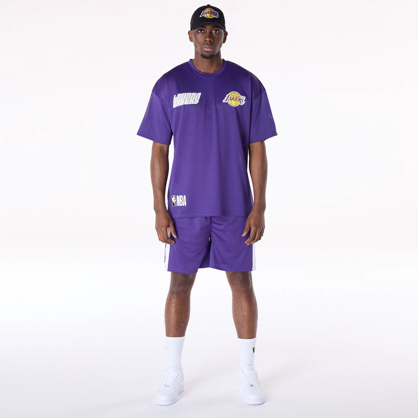 The Male model is wearing LA Lakers NBA Graphic Purple Mesh T-Shirt 3