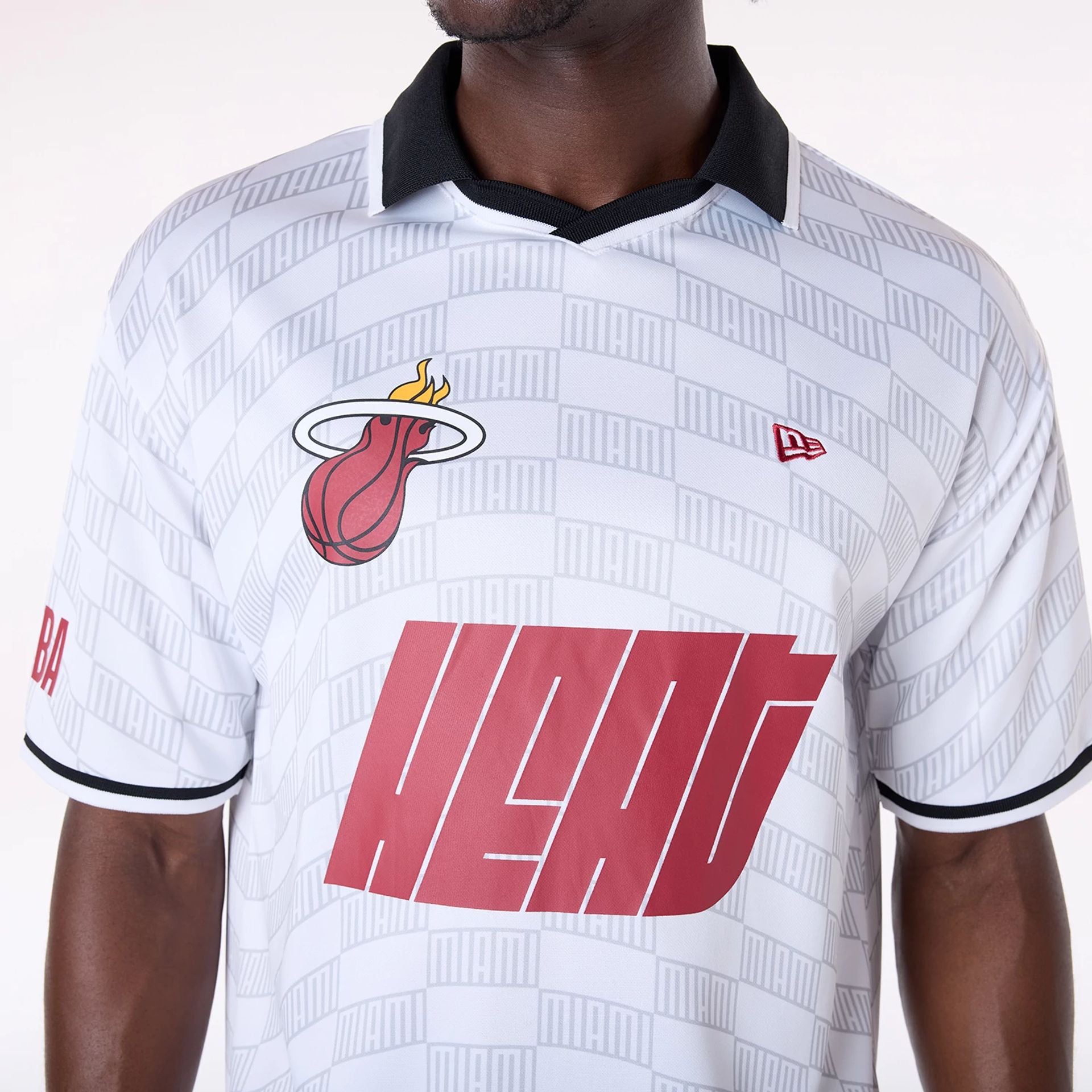 The Male model is wearing Miami Heat NBA Soccer White Oversized T-Shirt 2