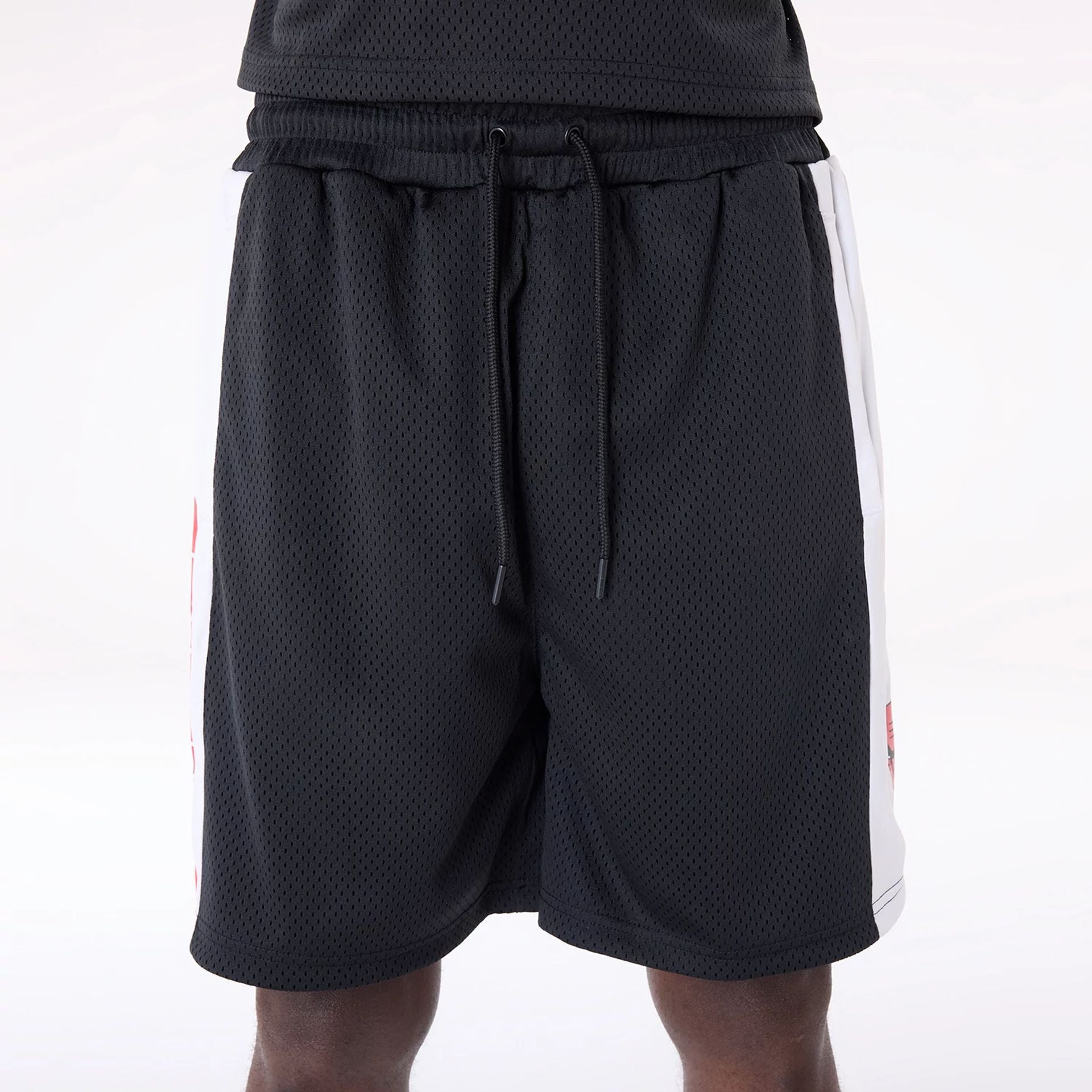 The Male model is wearing Chicago Bulls NBA Graphic Black Mesh Shorts 5