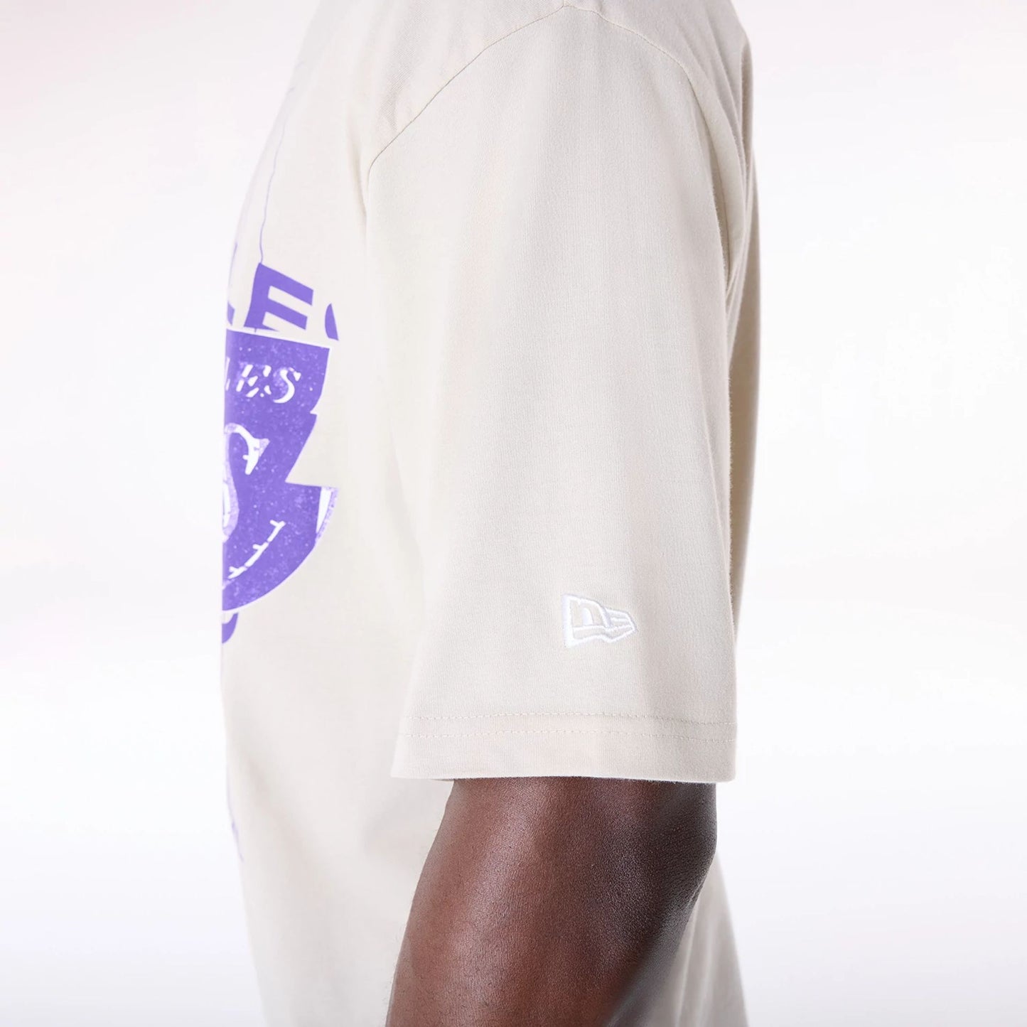 The Male model is wearing LA Lakers NBA Graphic Cream T-Shirt 4