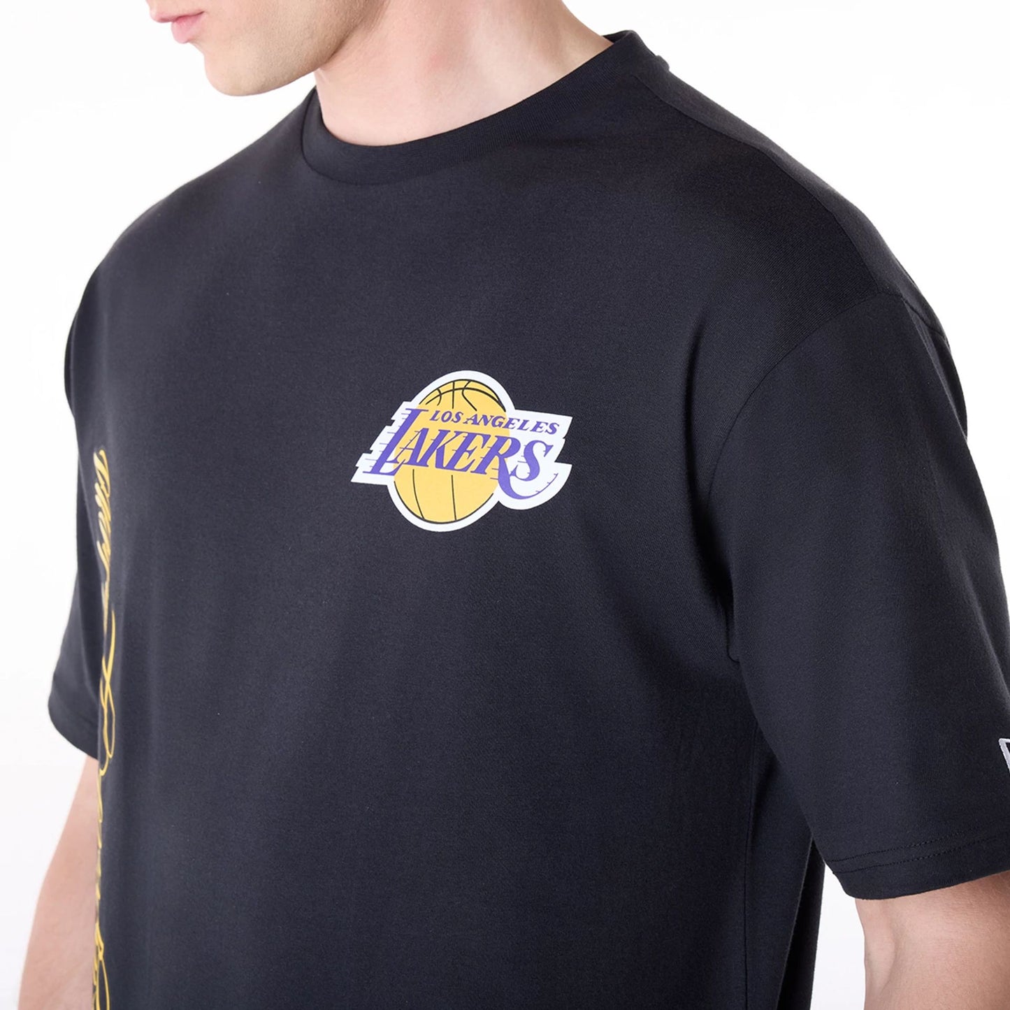 The Male model is wearing LA Lakers NBA Font Graphic Black T-Shirt 5