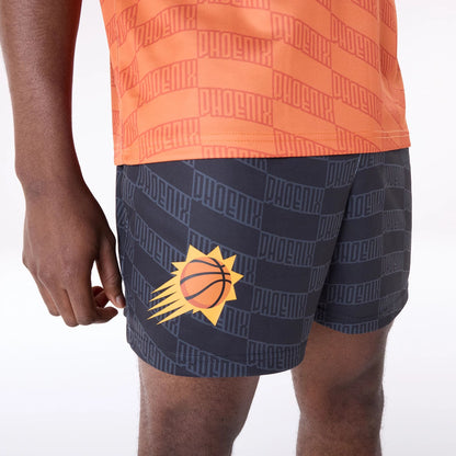 The Male model is wearing Phoenix Suns NBA All Over Print Graphic Black Shorts 2