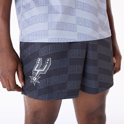 The Male model is wearing San Antonio Spurs NBA All Over Print Graphic Black Shorts 2