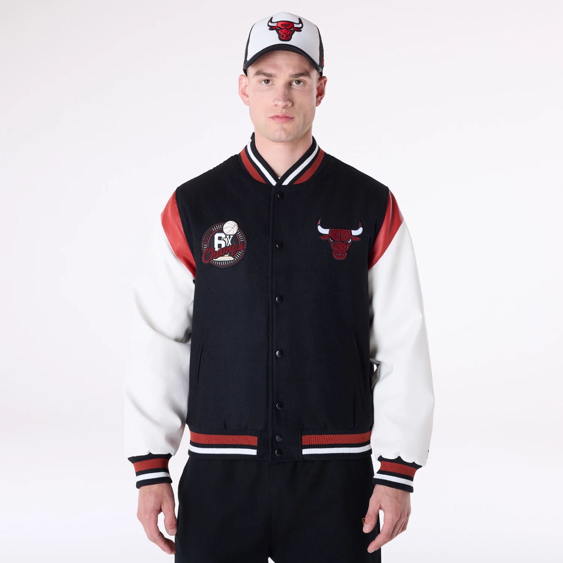 The Male model is wearing Chicago Bulls NBA Floral Black Varsity Jacket 1