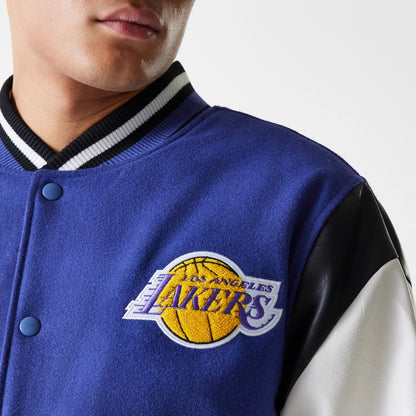 The Male model is wearing LA Lakers NBA Floral Dark Blue Varsity Jacket 4