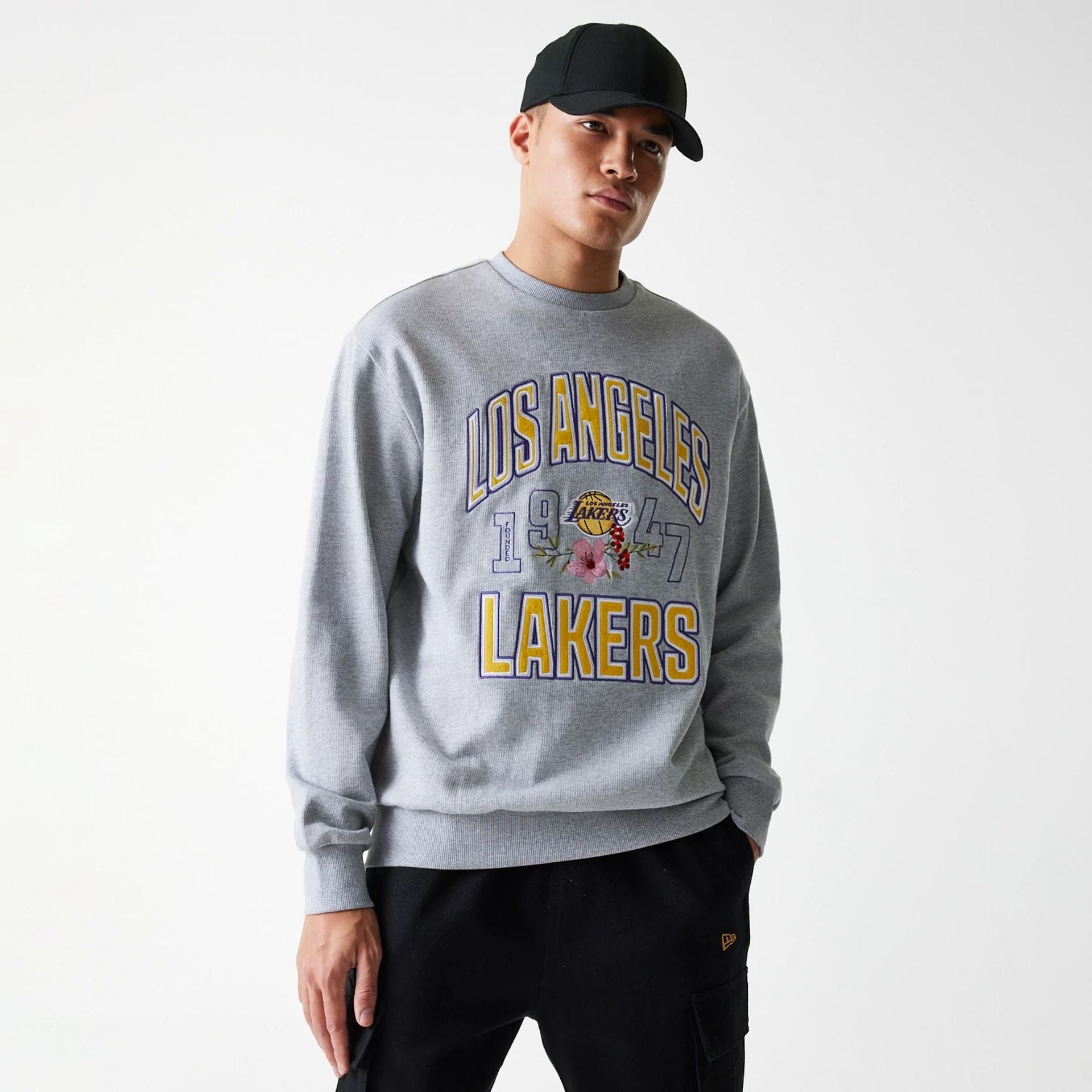 The Male model is wearing LA Lakers NBA Floral Grey Oversized Crew Neck Sweater 1