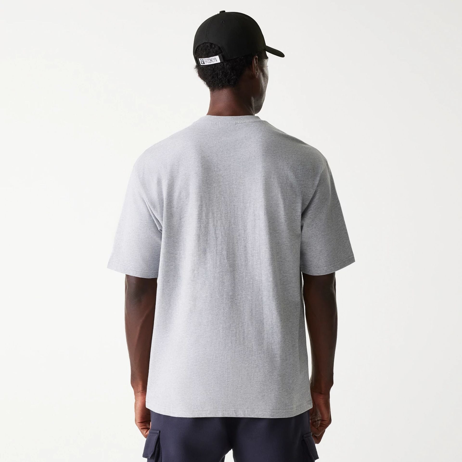 The Male model is wearing Brooklyn Nets NBA Distressed Grey Oversized T-Shirt 2