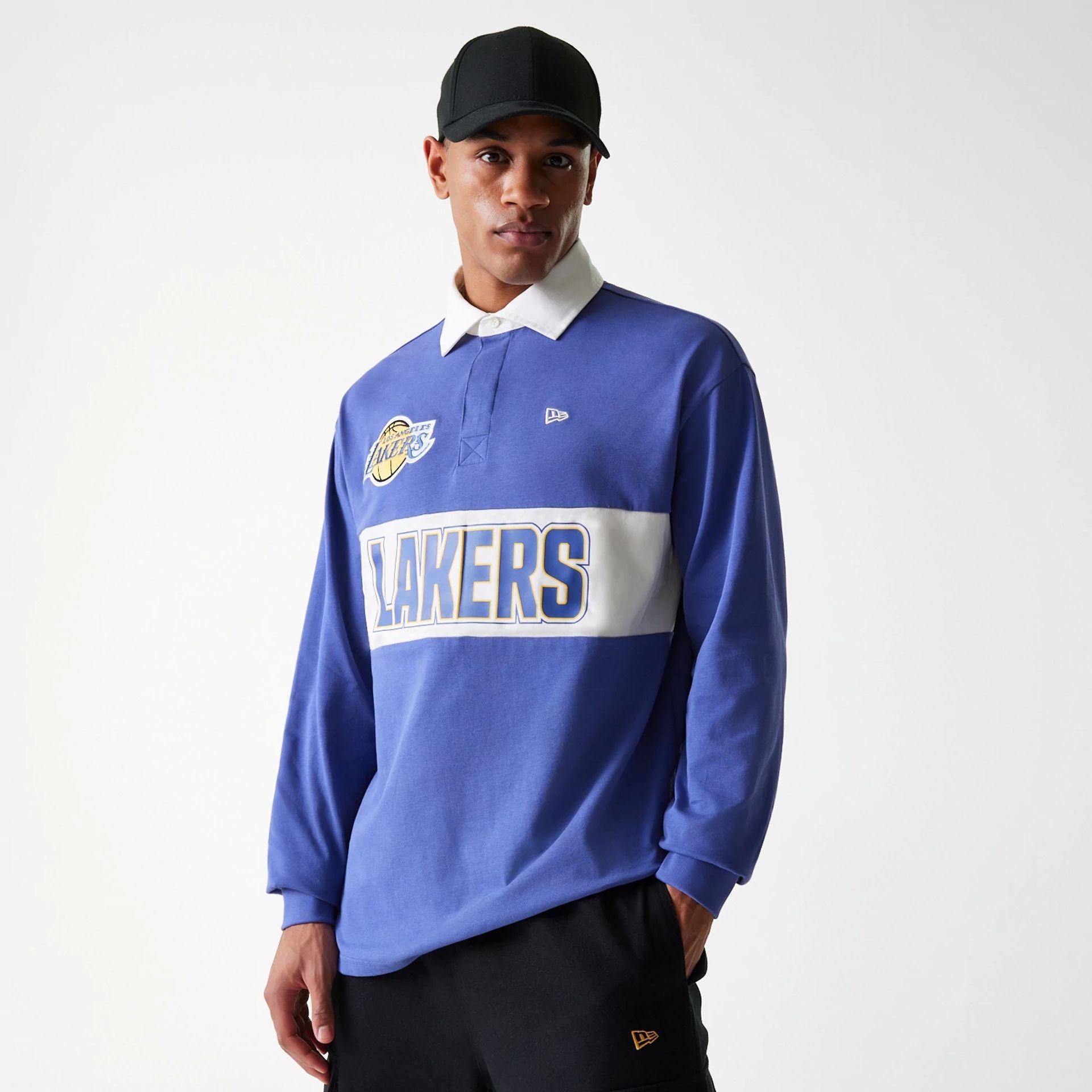 The Male model is wearing LA Lakers NBA Rugby Dark Blue Long Sleeve Polo 1