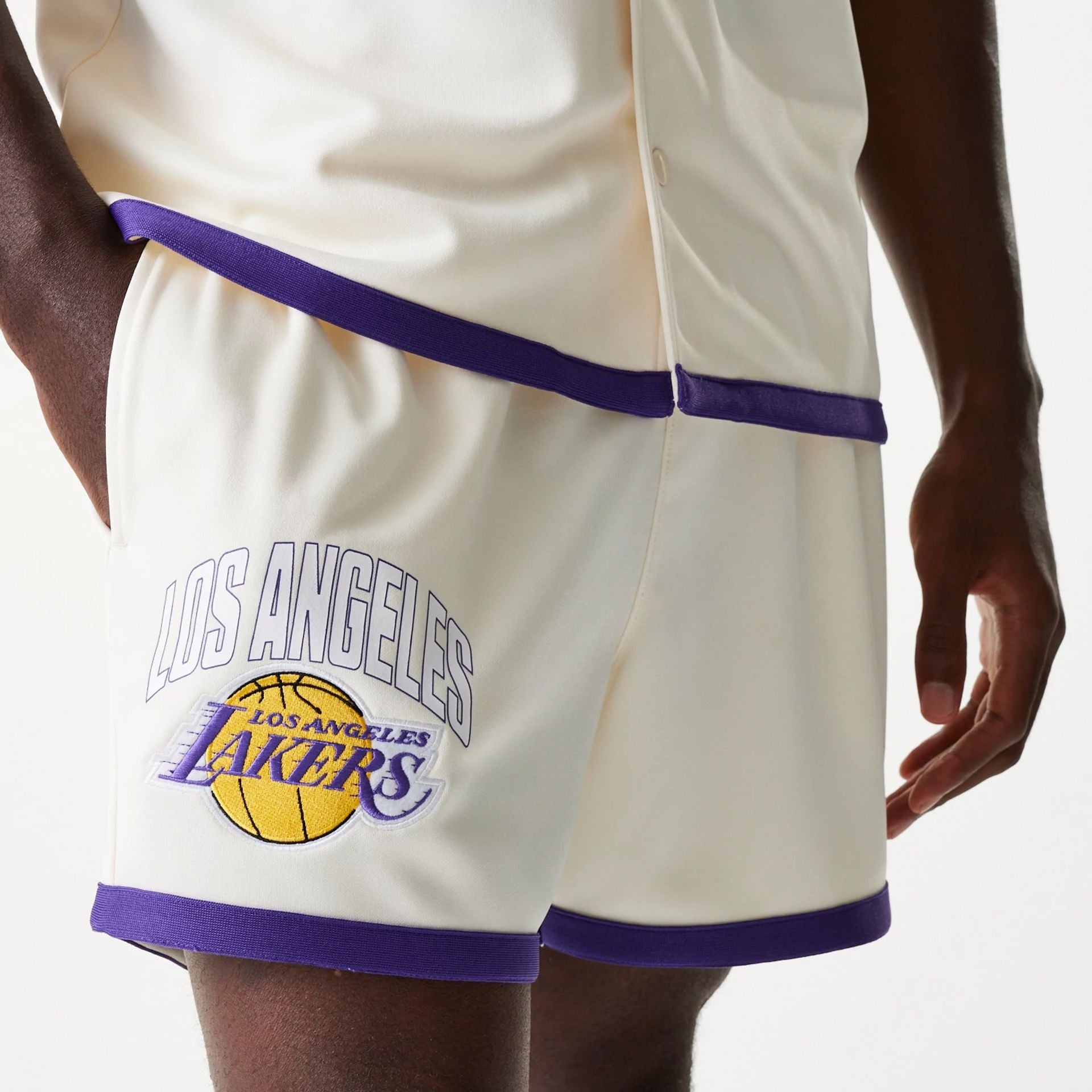 The Male model is wearing LA Lakers NBA Team Logo Open White Shorts 2