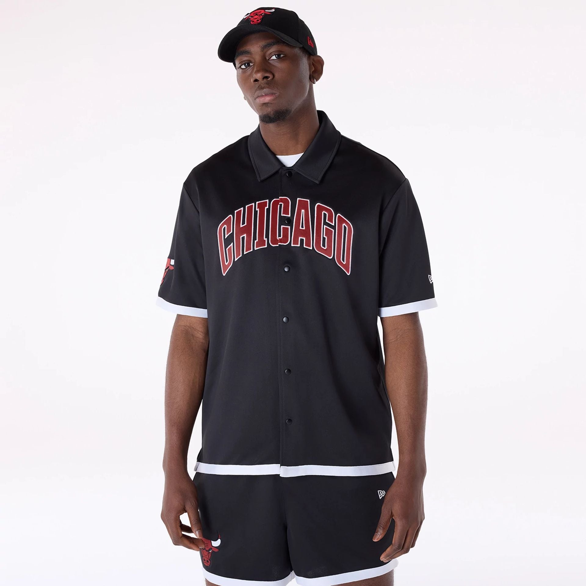 The Male model is wearing Chicago Bulls NBA Snap Button Black Short Sleeve Shirt 1