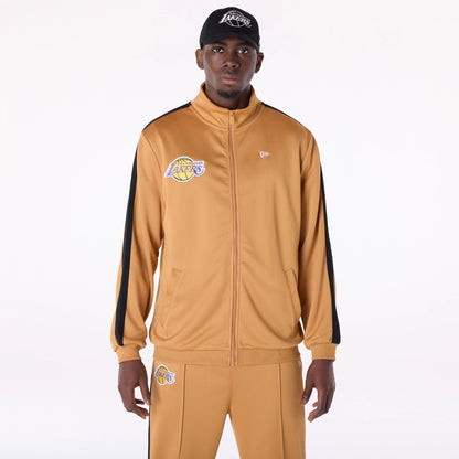 The Male model is wearing LA Lakers NBA Dark Beige Track Jacket 1