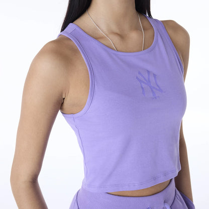 The Female model is wearing New York Yankees Womens MLB League Essential Purple Vest 7