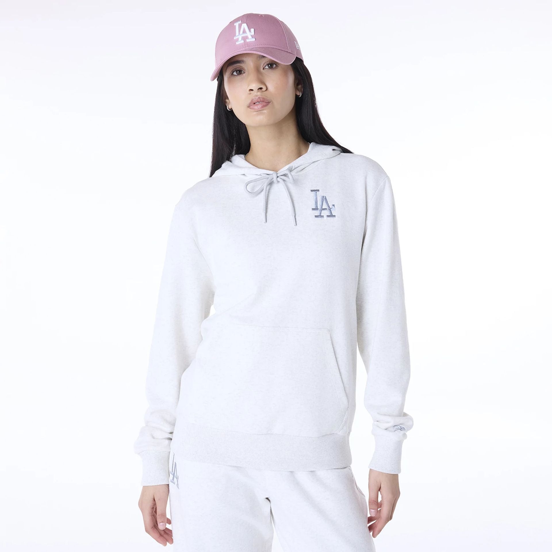 The Female model is wearing LA Dodgers Womens MLB League Essential White Pullover Hoodie 1