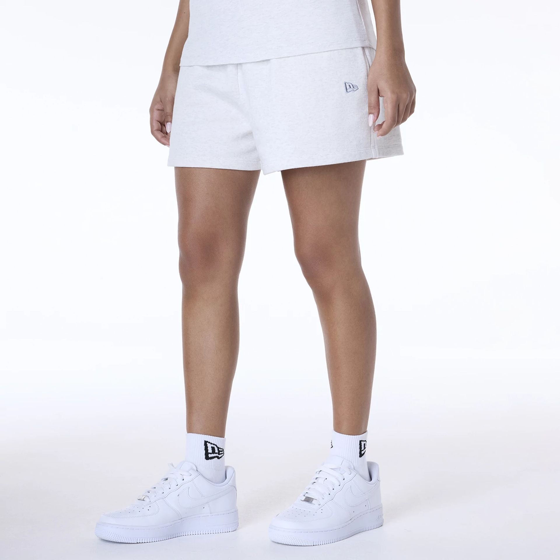 The Female model is wearing LA Dodgers Womens MLB League Essential Pastel Grey Shorts 2