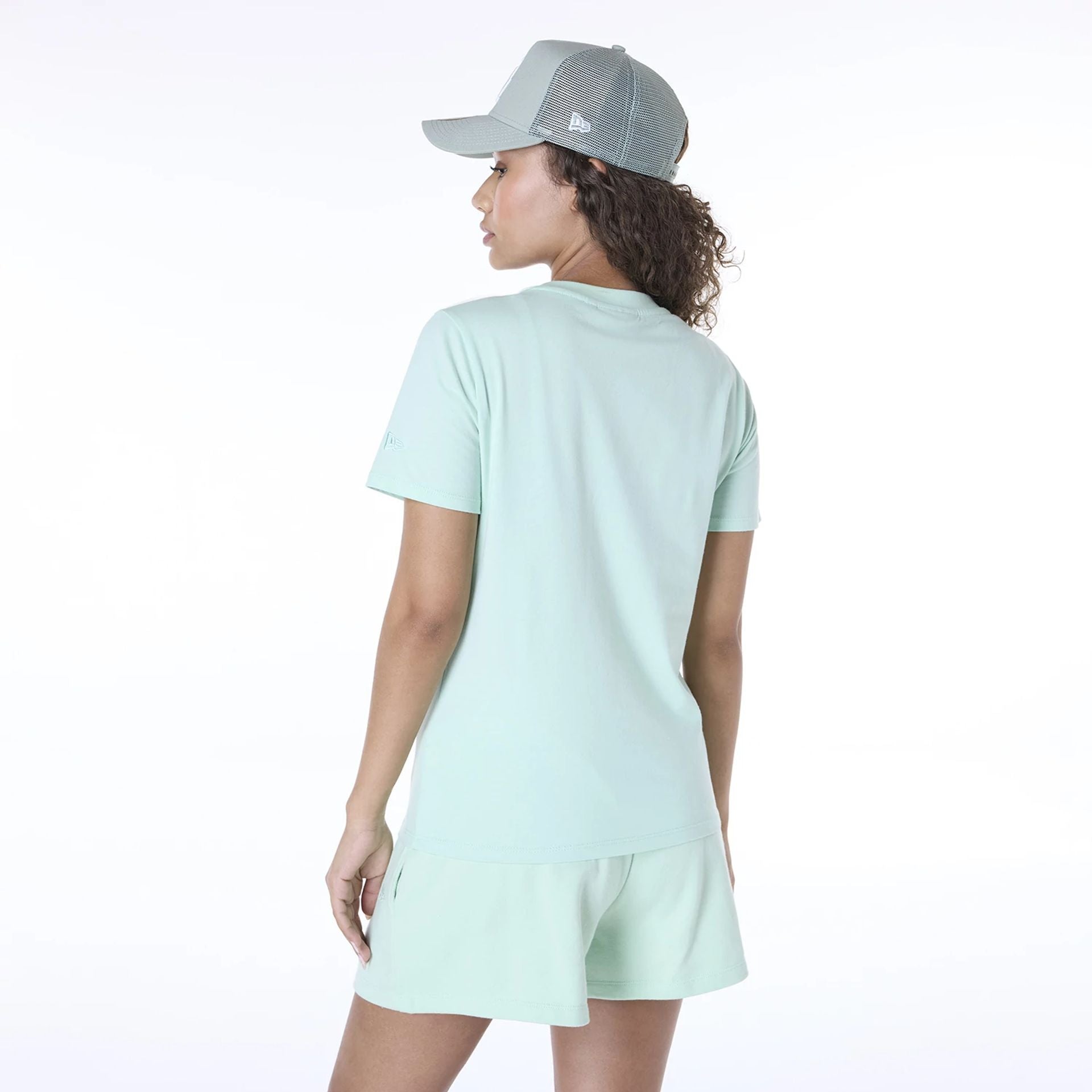 The Female model is wearing LA Dodgers Womens MLB League Essential Pastel Green T-Shirt 2