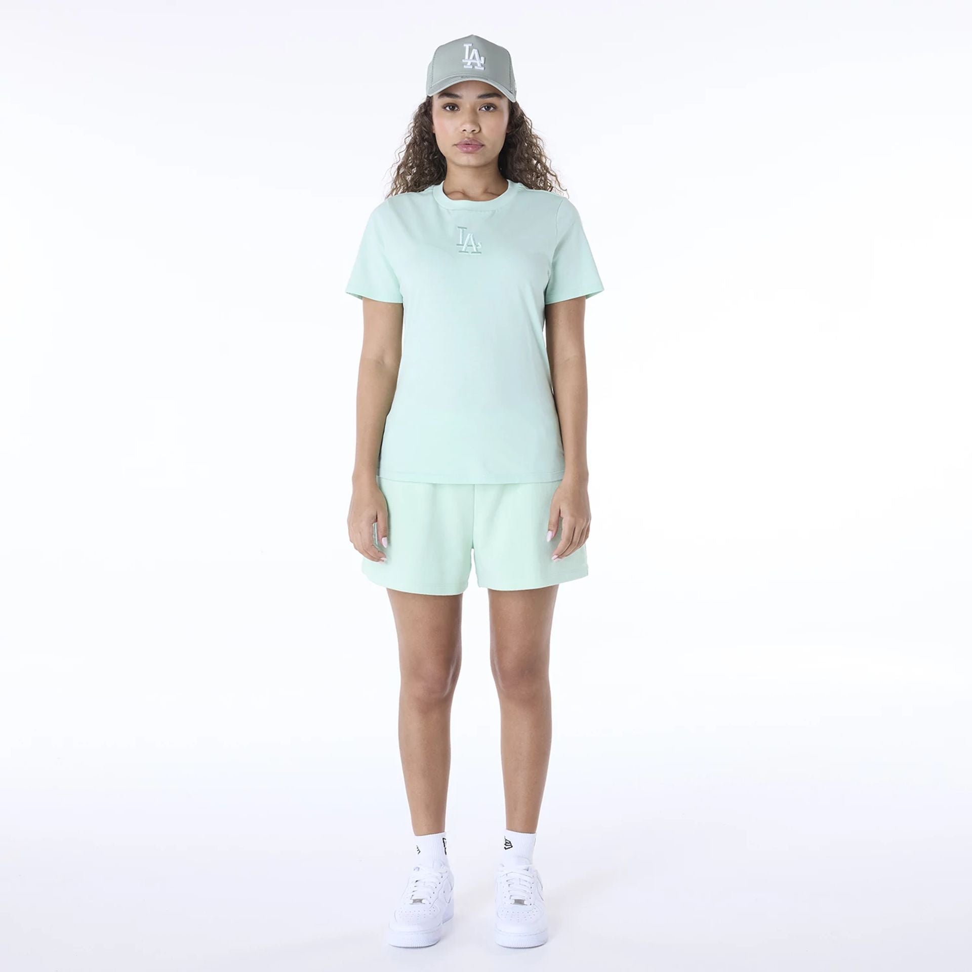 The Female model is wearing LA Dodgers Womens MLB League Essential Pastel Green T-Shirt 3