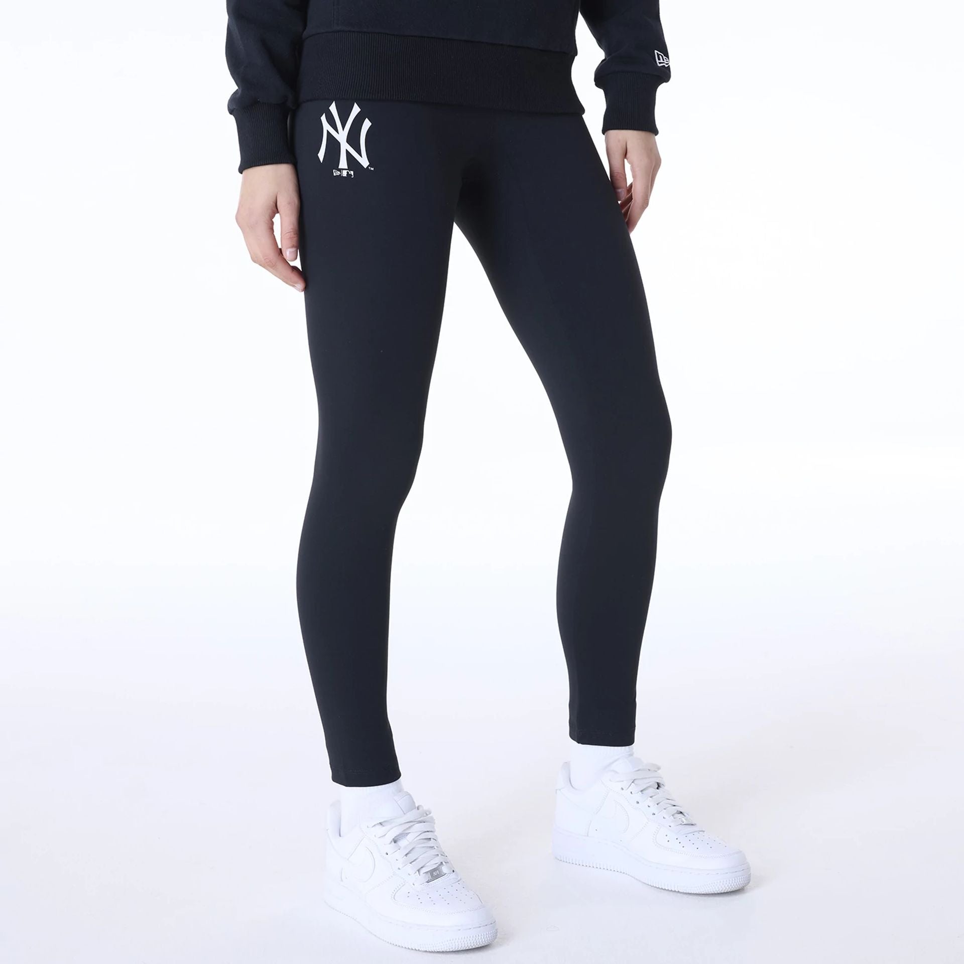 The Female model is wearing New York Yankees Womens MLB League Essential Black Leggings 1