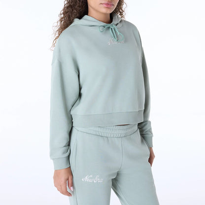 The Female model is wearing Womens New Era Script Pastel Green Pullover Hoodie 5