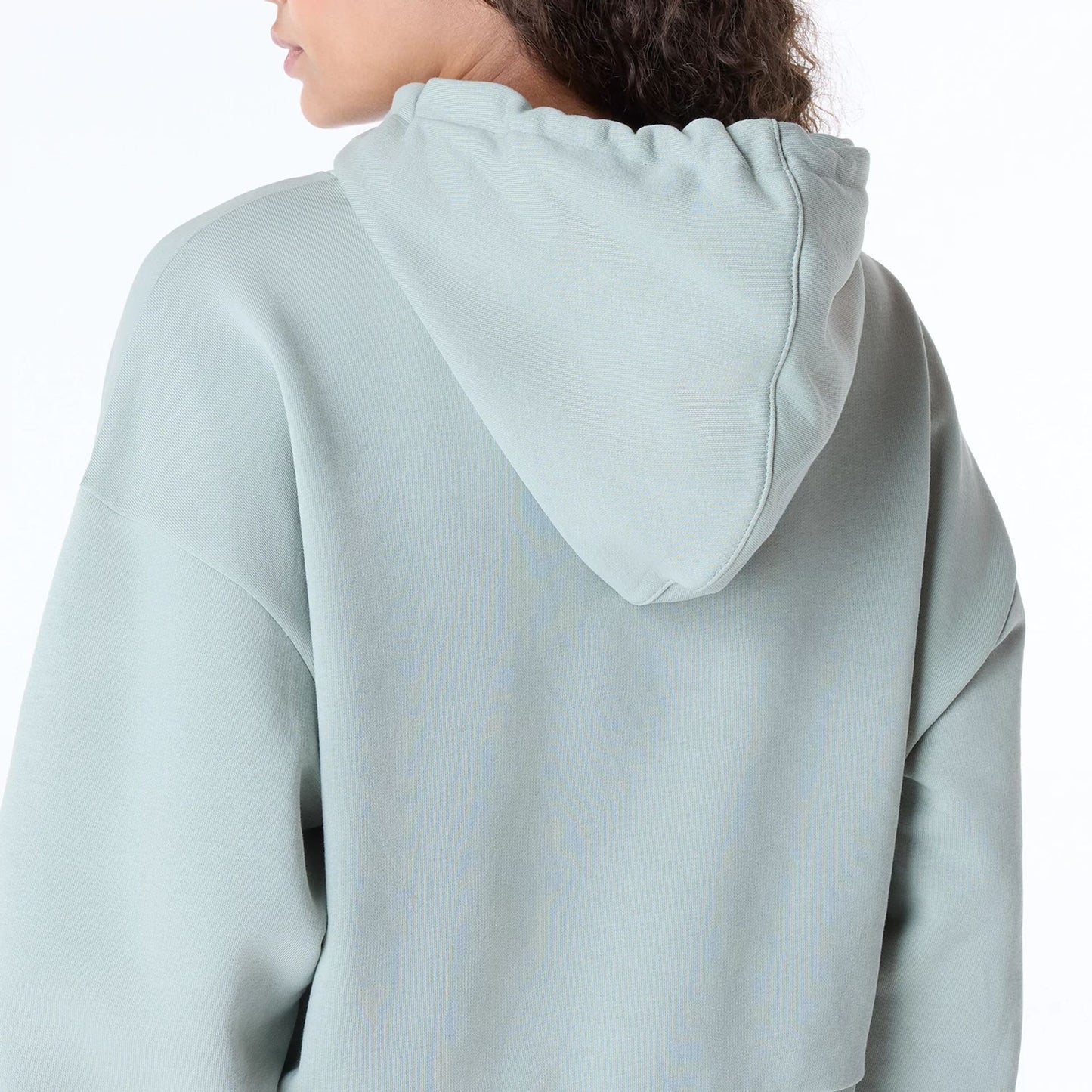 The Female model is wearing Womens New Era Script Pastel Green Pullover Hoodie 6