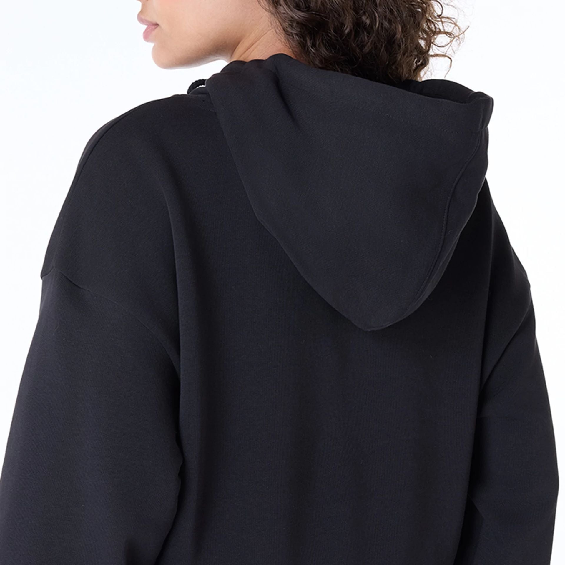 The Female model is wearing Womens New Era Script Black Pullover Hoodie 6