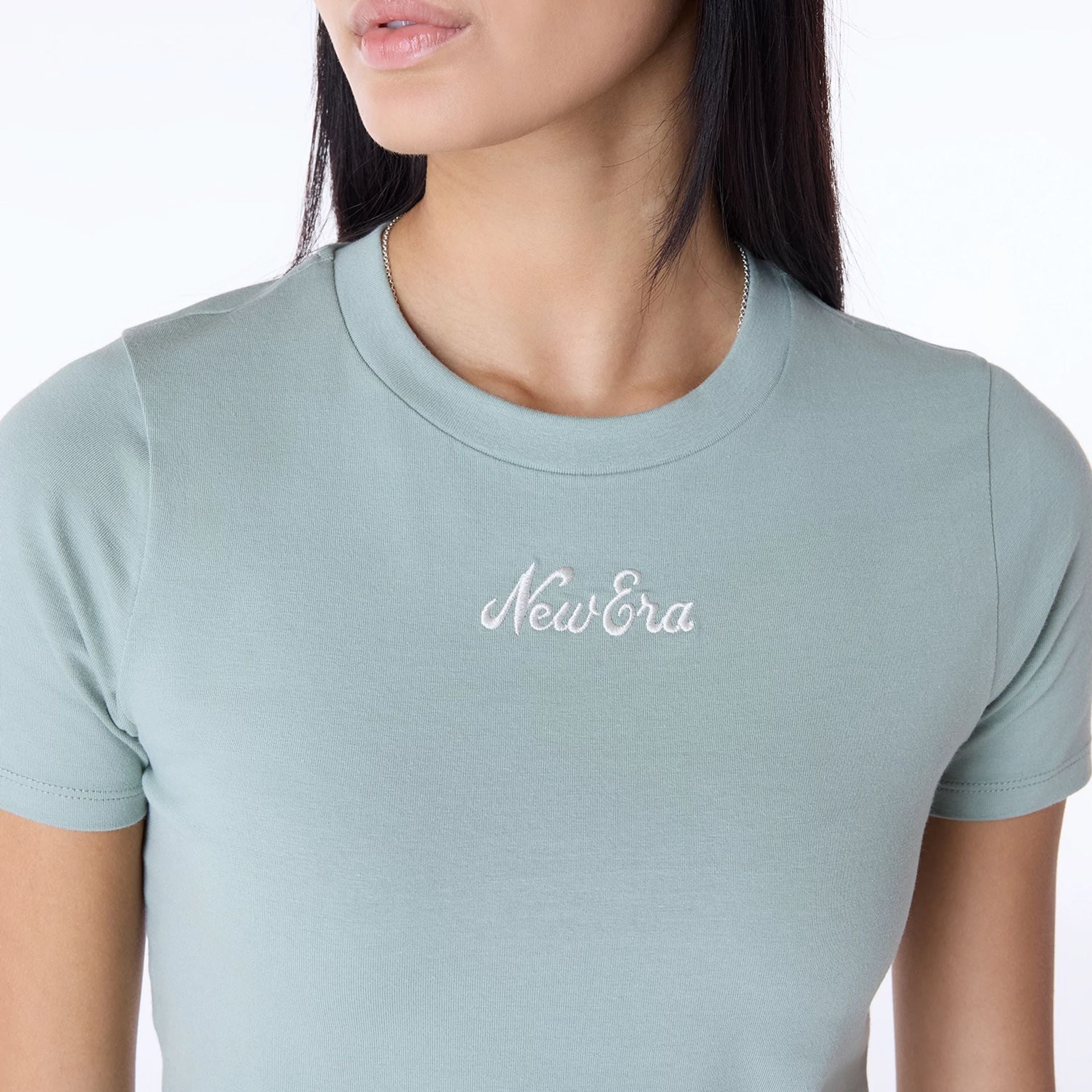 The Female model is wearing Womens New Era Slim Pastel Green T-Shirt 3