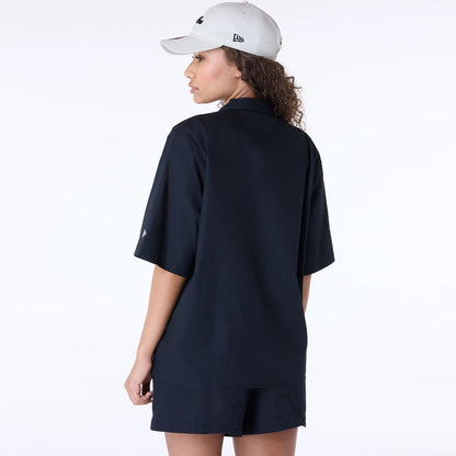 The Female model is wearing Womens New Era Revere Black T-Shirt 7