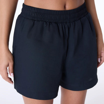 The Female model is wearing Womens New Era Cotton Black Shorts 3