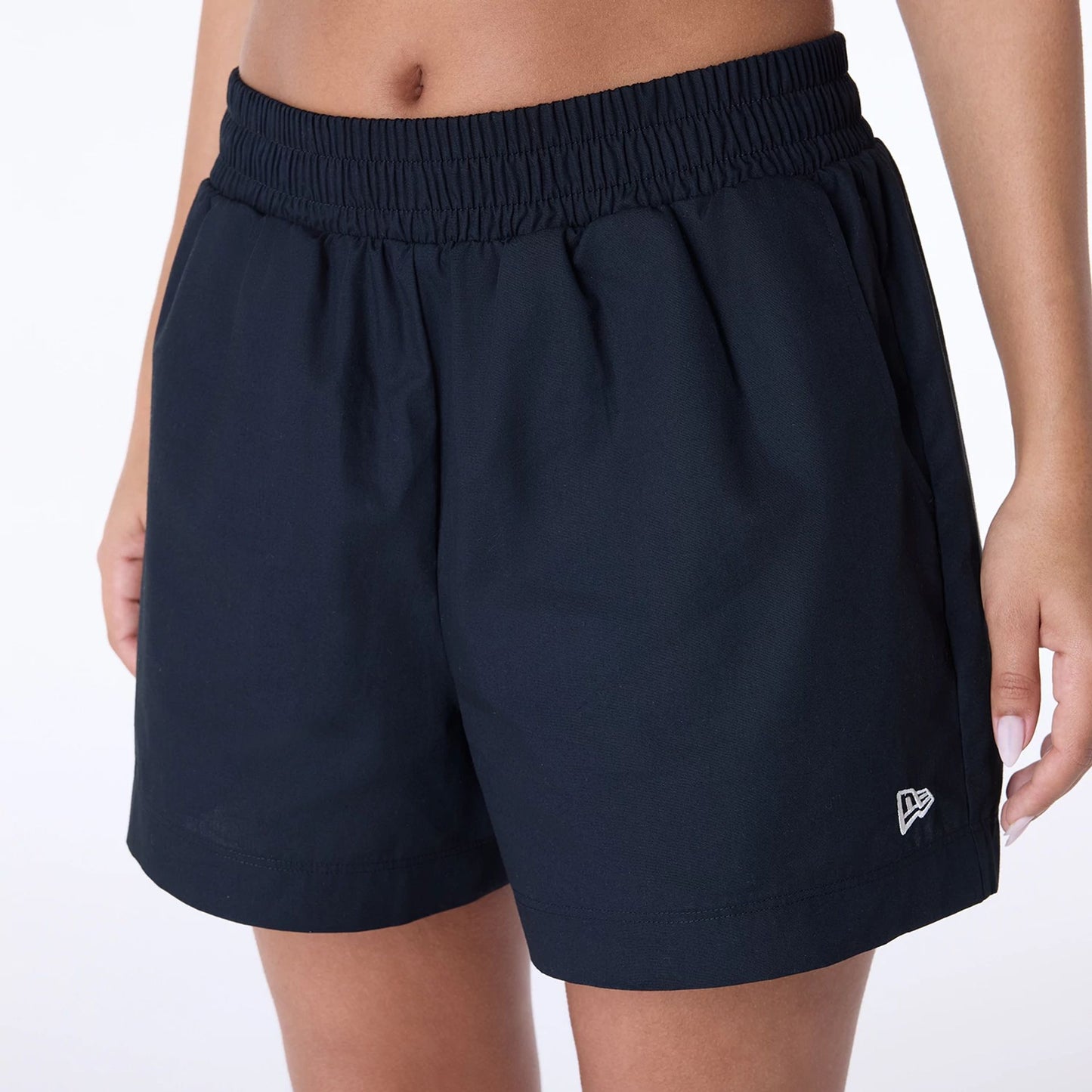 The Female model is wearing Womens New Era Cotton Black Shorts 6