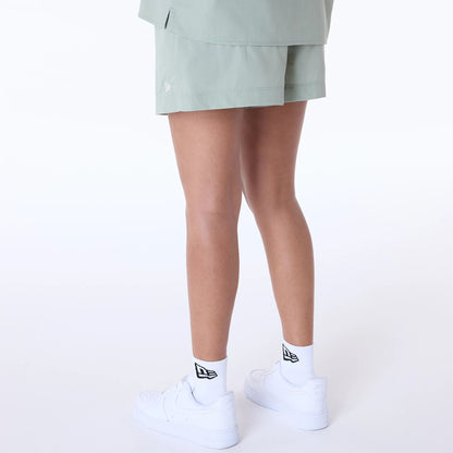 The Female model is wearing Womens New Era Cotton Pastel Green Shorts 7