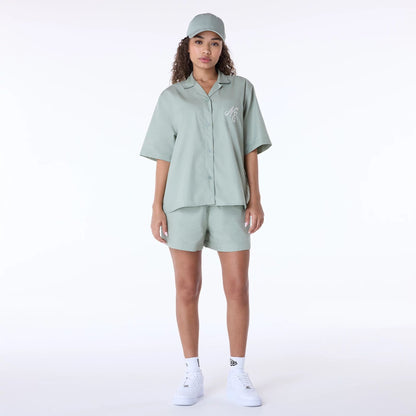 The Female model is wearing Womens New Era Cotton Pastel Green Shorts 8