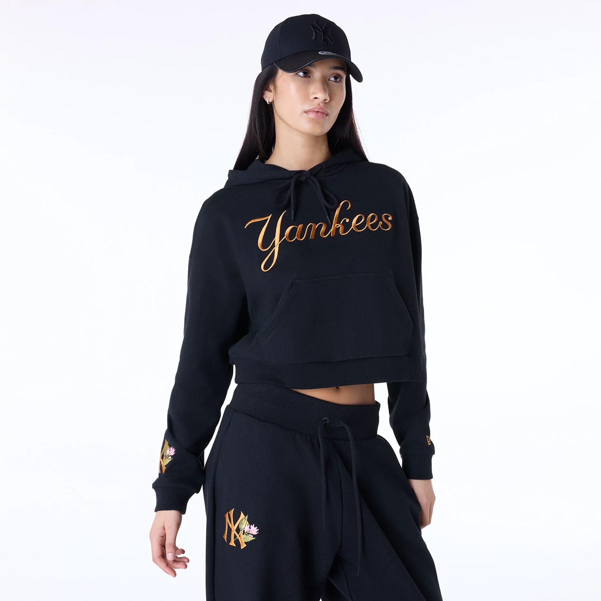 The Female model is wearing New York Yankees Womens MLB Graphic Black Pullover Hoodie 1