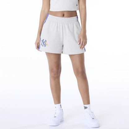 The Female model is wearing New York Yankees Womens MLB Floral Light Beige Shorts 1